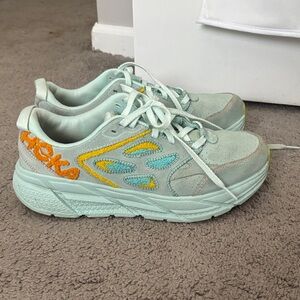 Hoka Women's Clifton’s one one suede in the blue glass color